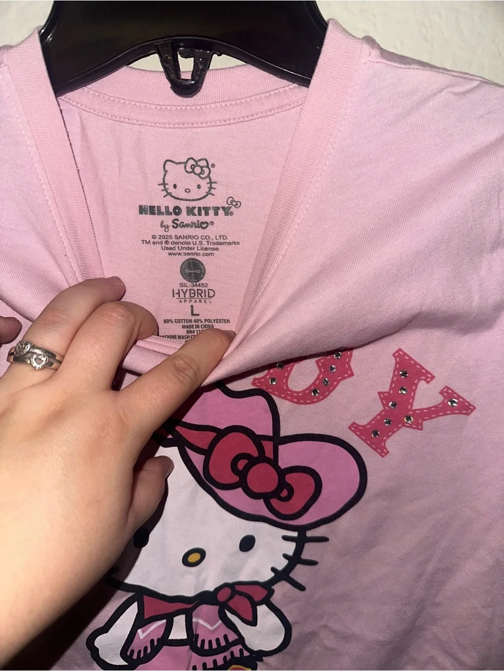 Hello kitty pink cowgirl top size large